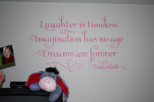 First, we spruced up the girls' room with this wall quote: