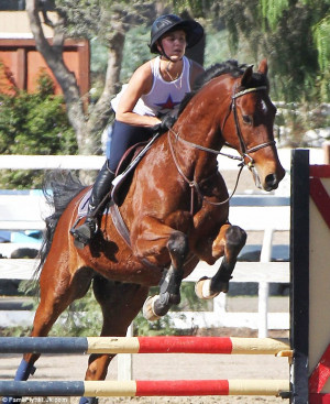 ... Kaley Cuoco shows off her impressive horse-riding and jumping skills