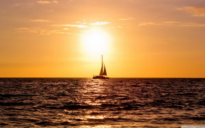 ocean reflection sailboat sailing sea sky sun sunset sunshine
