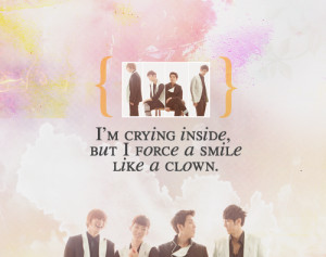 crying inside but I force a smile like a clown.