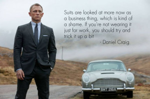 photo Daniel Craig is wearing a slim fit, two-button charcoal suit ...