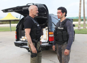 Still of Terry O'Quinn and Ramon Rodriguez in Gang Related (2014)