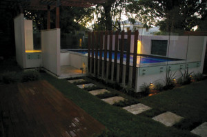 Hide Your Filtration Equipment Behind A Beautiful Back Yard Feature