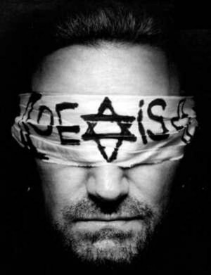 In the picture above looks Bono wearing an eye patch, which shows the ...