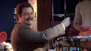 Ron Swanson serving himself some bacon