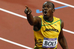 DAVID GRAY/REUTERS Jamaica's Usain Bolt reacts after he won the men's ...