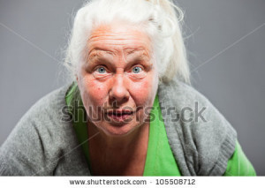Funny expressive senior woman. Acting young. Studio shot isolated on ...
