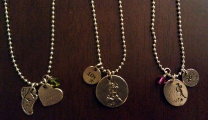 arranged the charms on the chains for a picture, but half the fun is ...