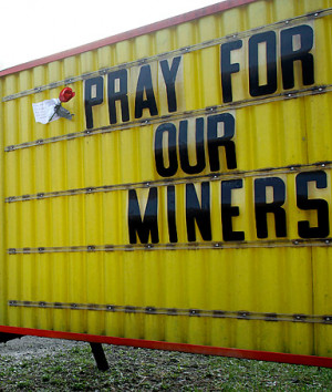 sign expressing hope for coal miners stands near an entrance to the ...