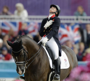 What a relief! Charlotte Dujardin, of Great Britain, celebrates after ...