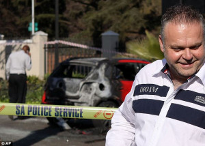 Rodovan Krejcir stands in front of the stolen red VW Polo which had ...