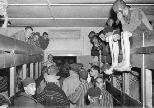 Inspection of crowded barracks at Dachau, May 1945