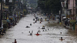 Under water ... the flooding in Manila. Photo: AP