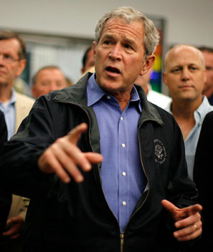 President George W. Bush speaks to a room of emergency workers ...