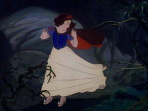 Snow White fleeing through the forest.
