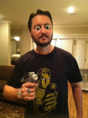 Googly eyes and holding a phaser