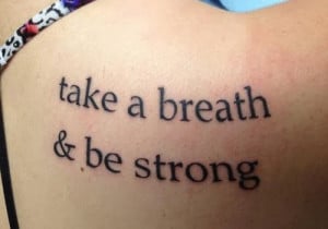 Strength quote tattoos for women