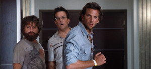 Zack Galifianakis, Ed Helms, and Bradley Cooper star in THE HANGOVER.