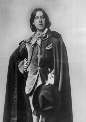 ca. 1875-1885 --- Original caption: Oscar Wilde, knee length portrait ...