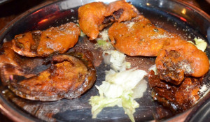 Lamb fried in a chickpea batter is one of the offerings at New Punjab ...