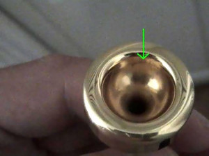 Red spots on gold mouthpiece