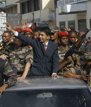 Opposition leader Andry Rajoelina parades through the narrow streets