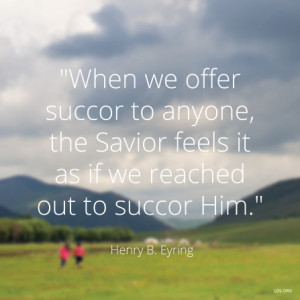 field with mountains beyond and a quote by President Henry B. Eyring ...