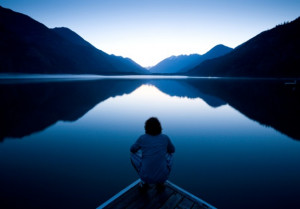 Person Sitting Quietly on the Edge of a Dock - Photo courtesy of ...