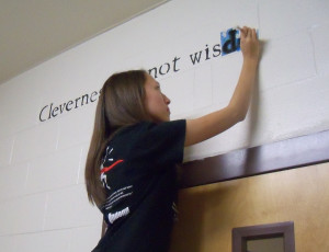 NHS students stencil the halls with meaningful quotes