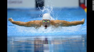 ... competes in the men's 200-meter butterfly semifinal swimming event