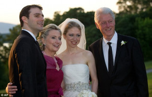 ... Clinton, his bride Chelsea and father-in-law Bill Clinton after the
