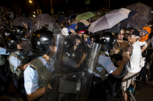 Protesters and police clash near Hong Kong's government headquarters ...