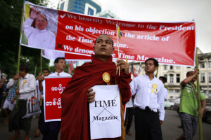 Buddhist monk and other protesters demonstrate against Time magazine ...