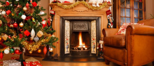 Christmas interior fire place in a living room in panoramic format