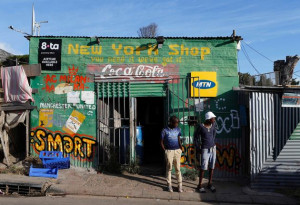 2014-04-20T090322Z_01_MSH05_RTRIDSP_3_SAFRICA-RETAIL-SPAZA-20-04-2014 ...