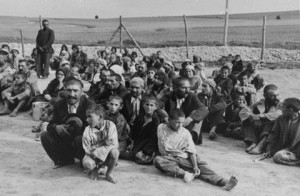 group of Gypsy prisoners, awaiting instructions from their German ...