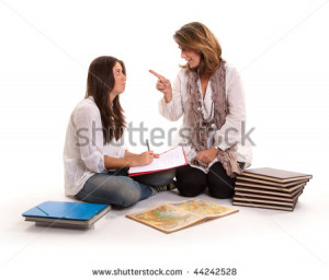 Angry Mother and her teenage daughter and homework - stock photo