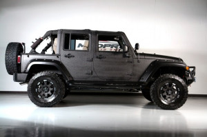 Who would do this to their Jeep? I like it. Rhino exterior.
