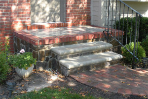 Brick and concrete porch and steps with stone work