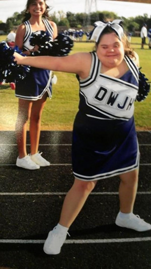 Teen with Down syndrome scores spot on high school cheerleading squad