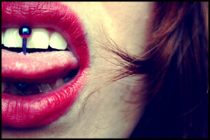 Girl with a tongue piercing II by Licsu