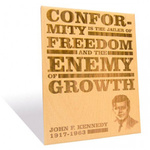 John F. Kennedy's famous quote etched on a Wooden Plaque