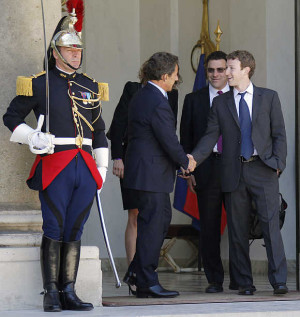 Image: France's then-president Nicolas Sarkozy shakes hands with Mark ...