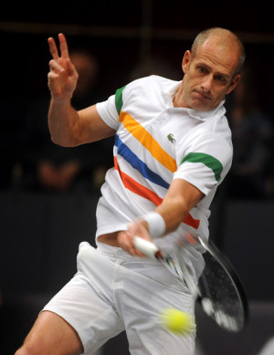 Guy Forget Guy Forget of France hits a forehand during the match