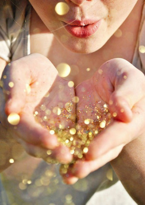 ... blowing glitter from the palms of her hands just make you love life