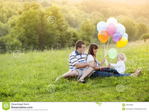 Happy family spending time together outdoor.