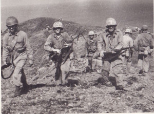 Marines during the first flag-raising on Iwo Jima.