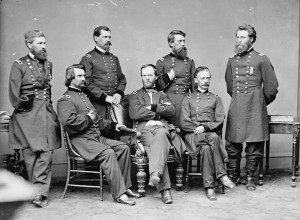 ... Davis, standing second from right, with General Sherman and his staff