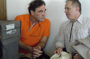 Director Oliver Stone with screenwriter Stanley Weiser on the set of W ...