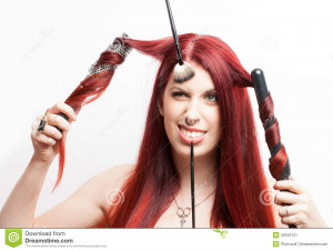 Woman with red hair having trouble with hair stylist in a beauty salon ...